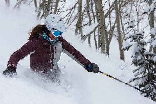 Ski test director for Onthesnow.com, Krista Crabtree, tests out deep powder at Snowbird, Utah.